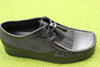 Men's Wallabee - High Shine Black Leather Side Angle View